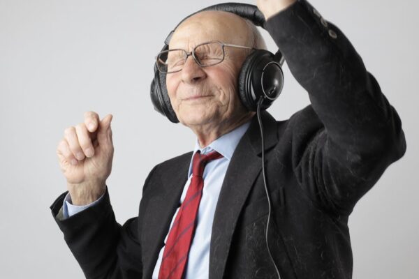 Man in Black Jacket Wearing Black Headphones